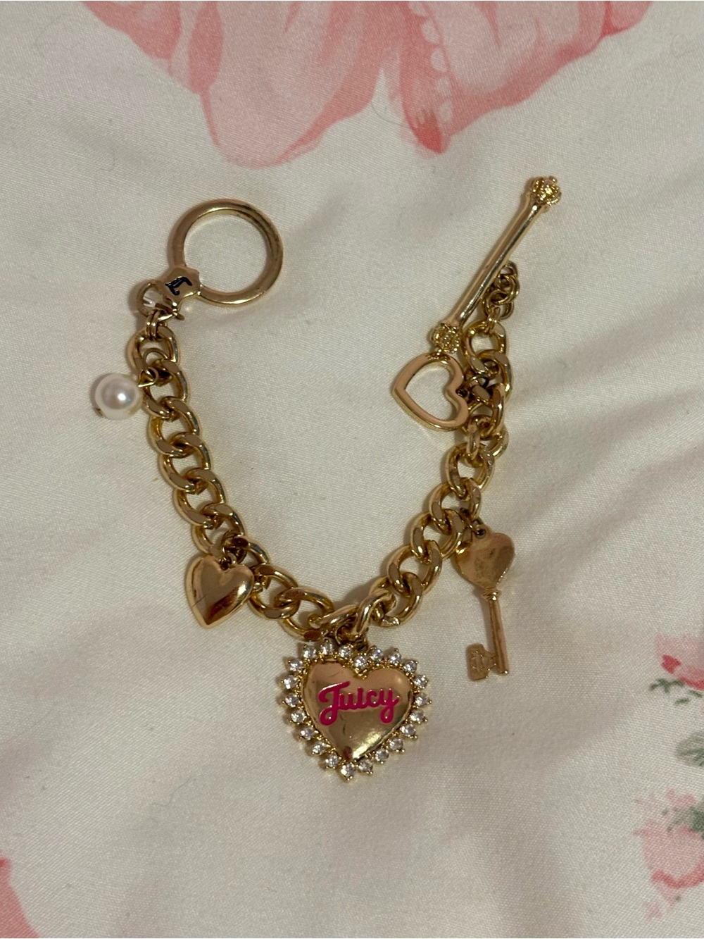 Juicy Couture Gold-Tone Heart Charm Bracelet with Pink Logo